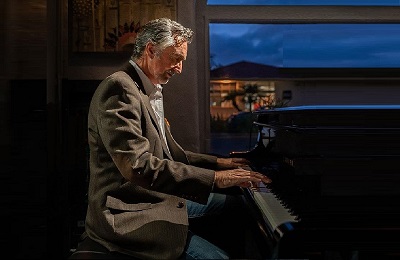 Randy Beecher playing piano