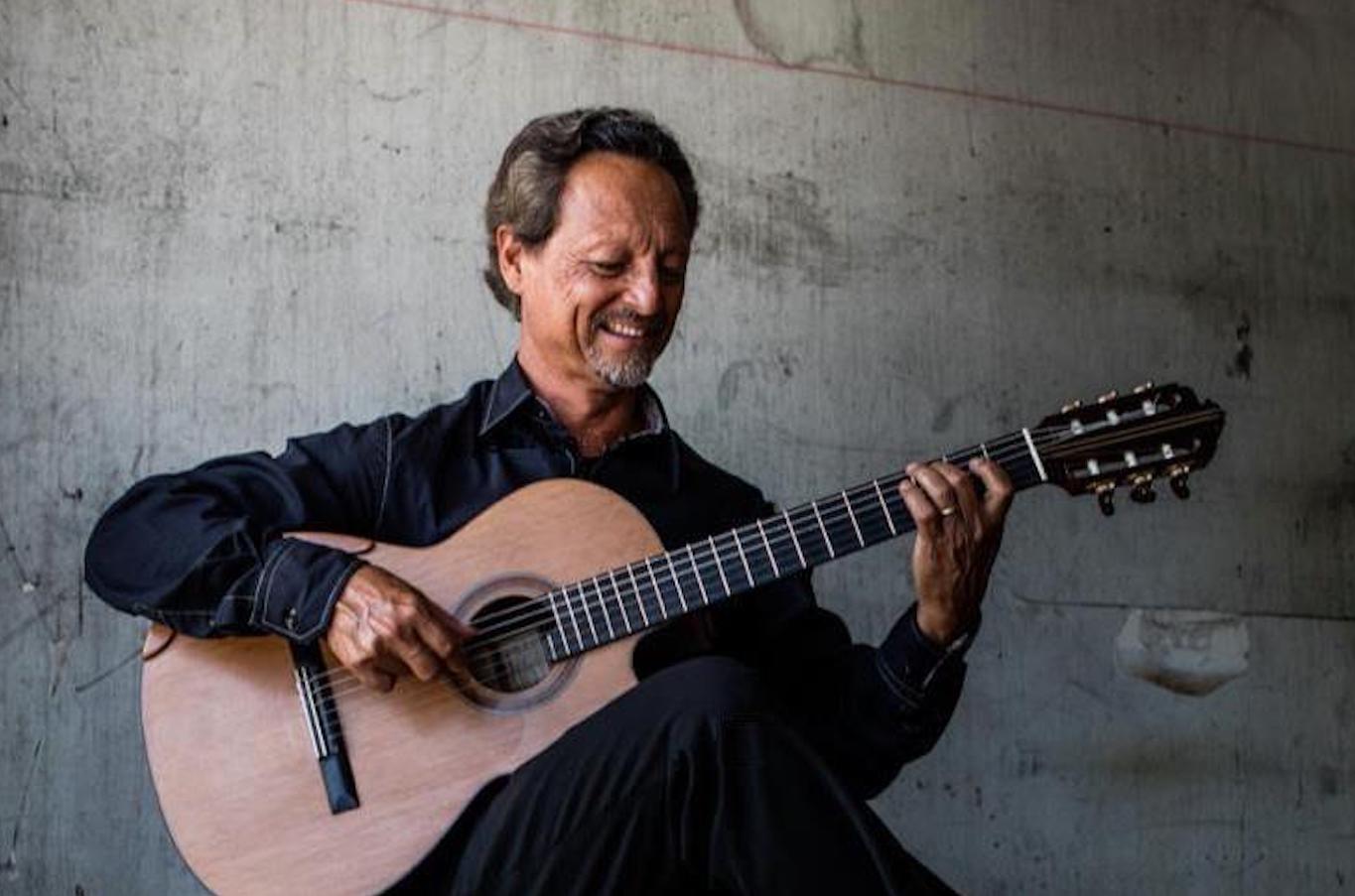 Instructor, Fred Benedetti with his classical guitar