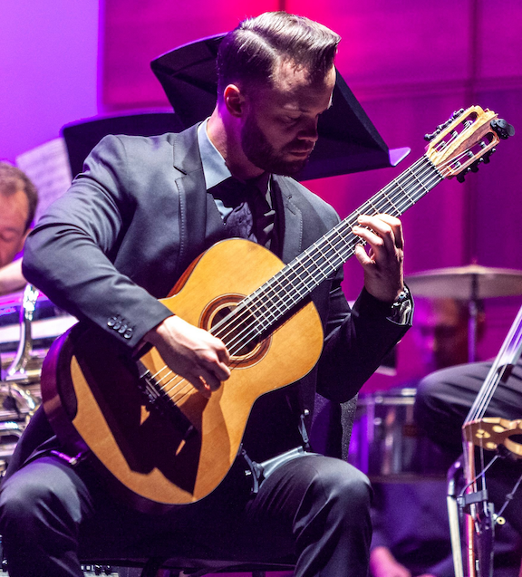 Sean Bassett performing on classical guitar